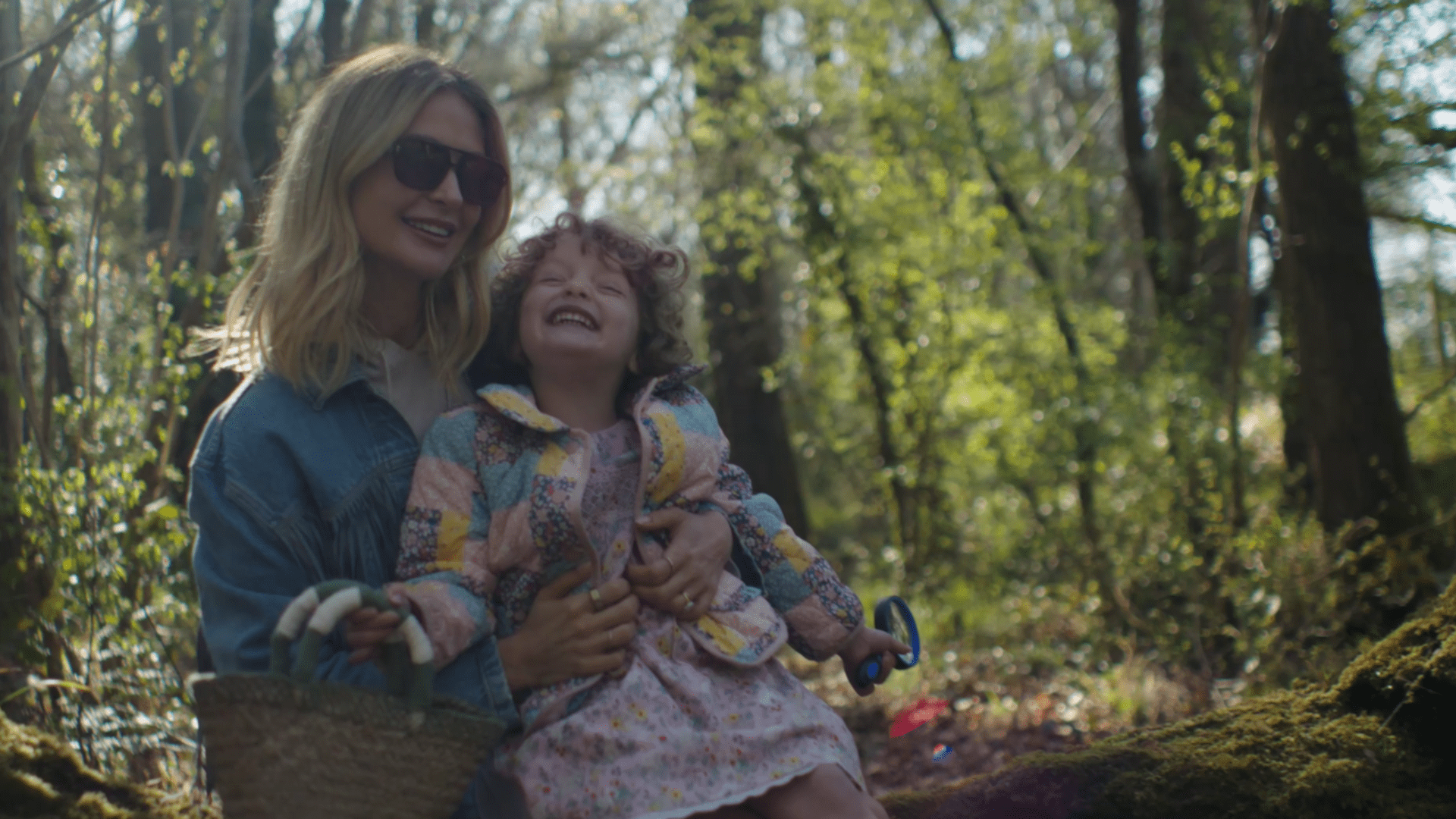Millie Mackintosh laughing with daughter in woodland