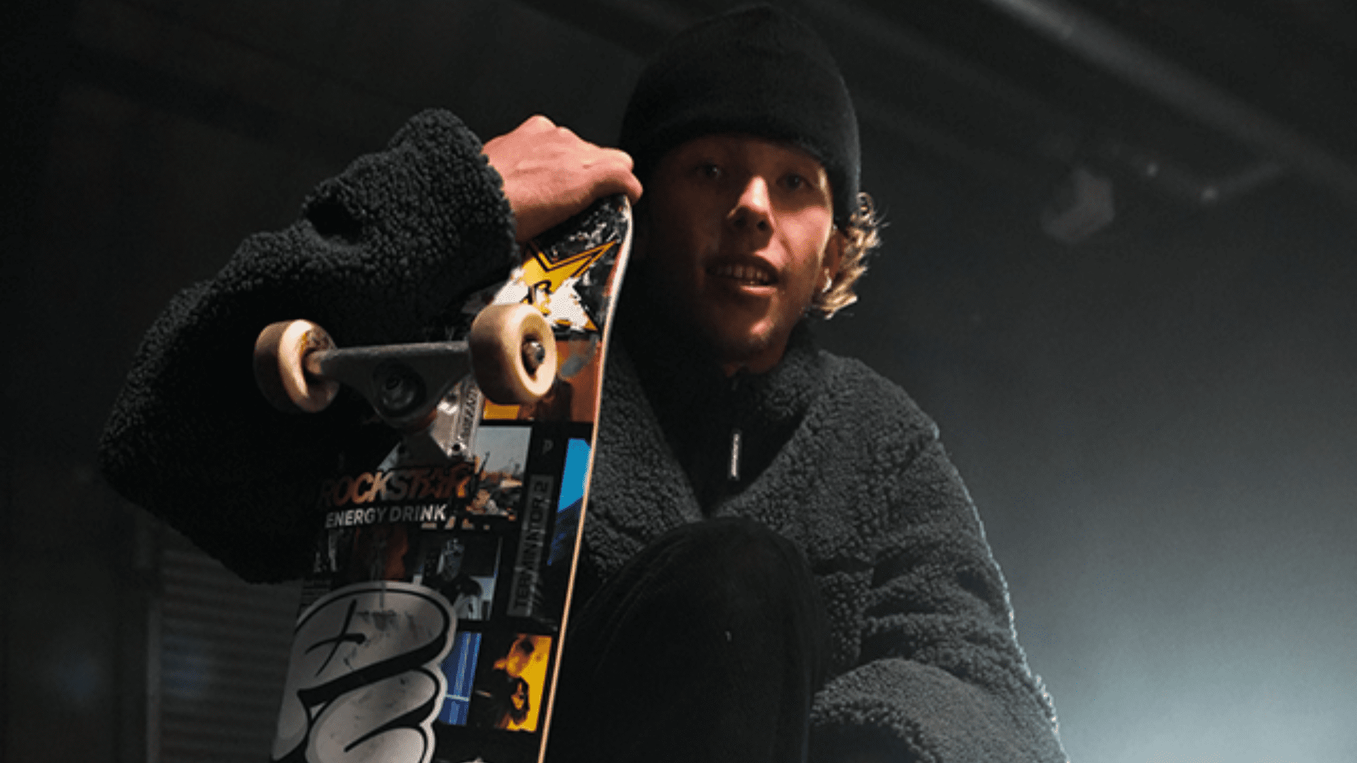 skateboarding Olympic gold medalist Keegan Palmer with skateboard